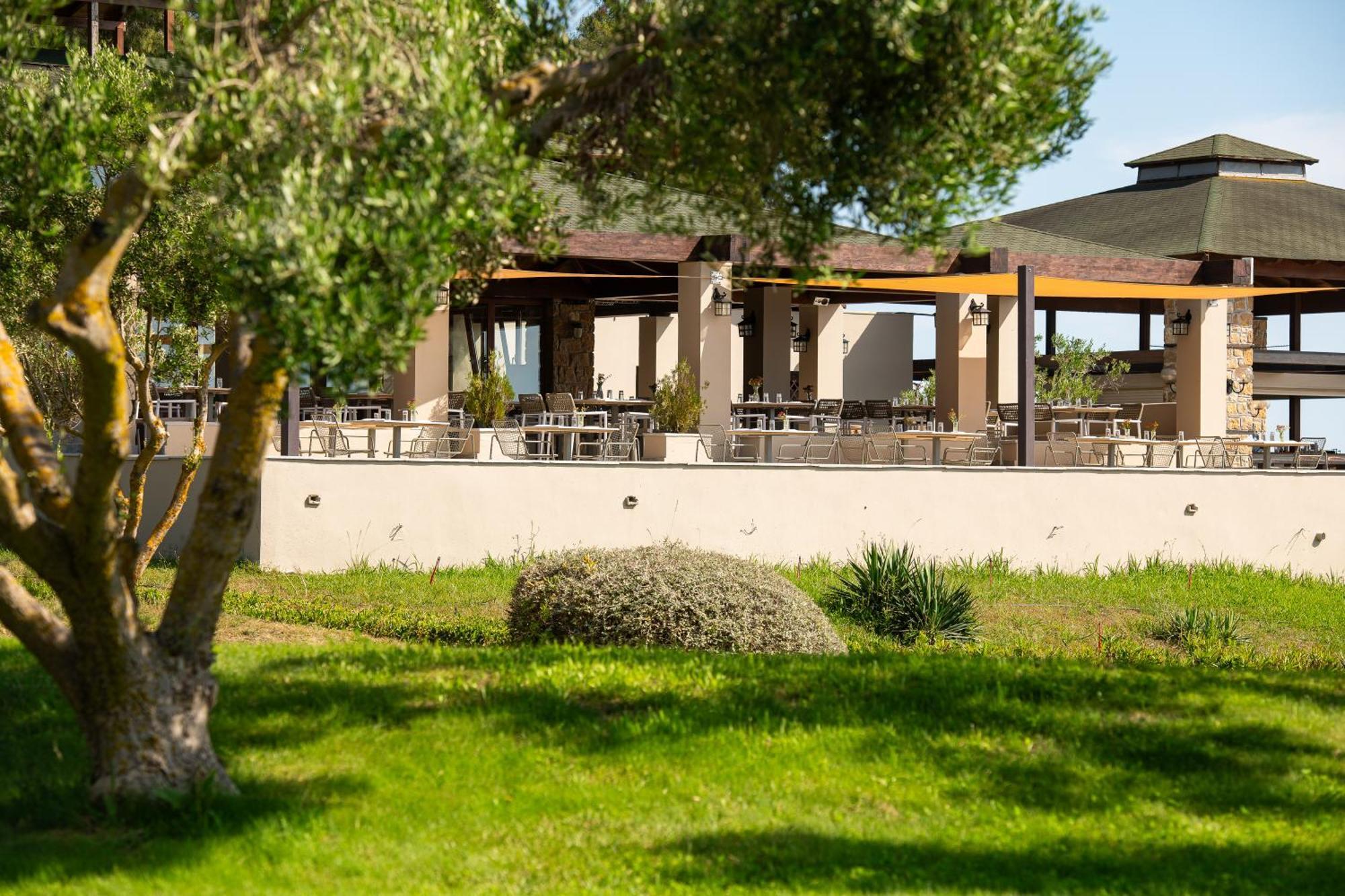Simantro Beach Sani  Esterno foto The campus of the University of Patras